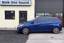 2017 Hyundai Accent with professional window tint in North Bay